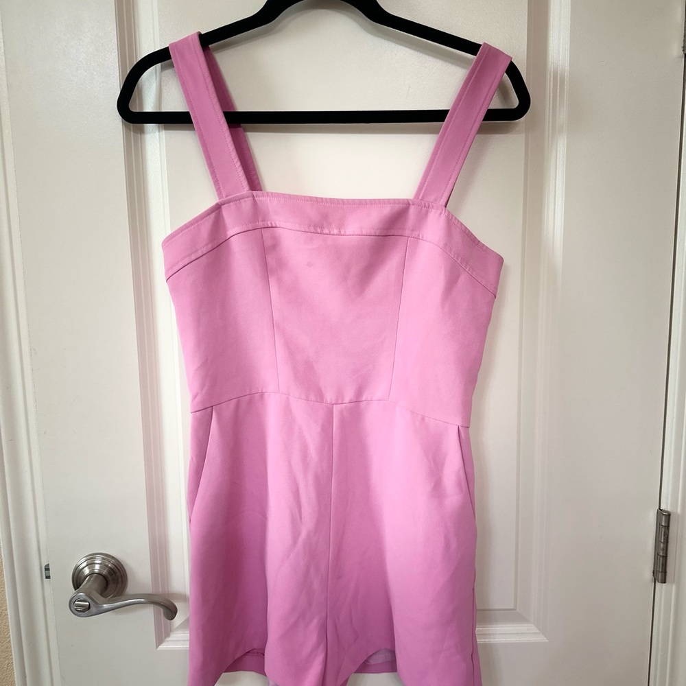 Fun pink romper. Would be great for a bachelorette!